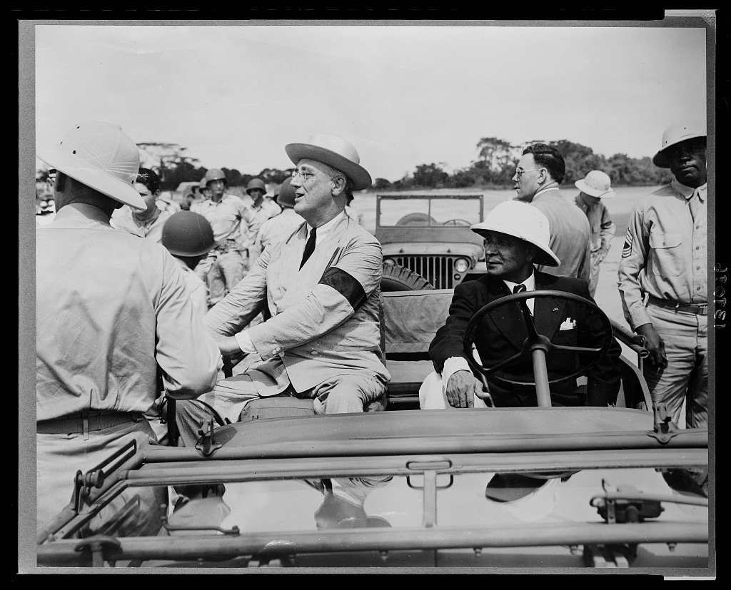 President Roosevelt and President Edwin Barclay of Liberia reviewing American troops in Liberia, 1943